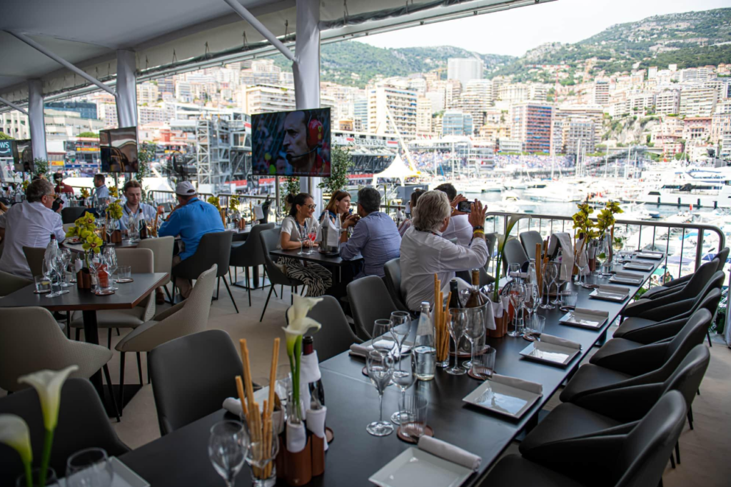 Guests enjoying a premium hospitality setting at a Formula 1 Grand Prix.