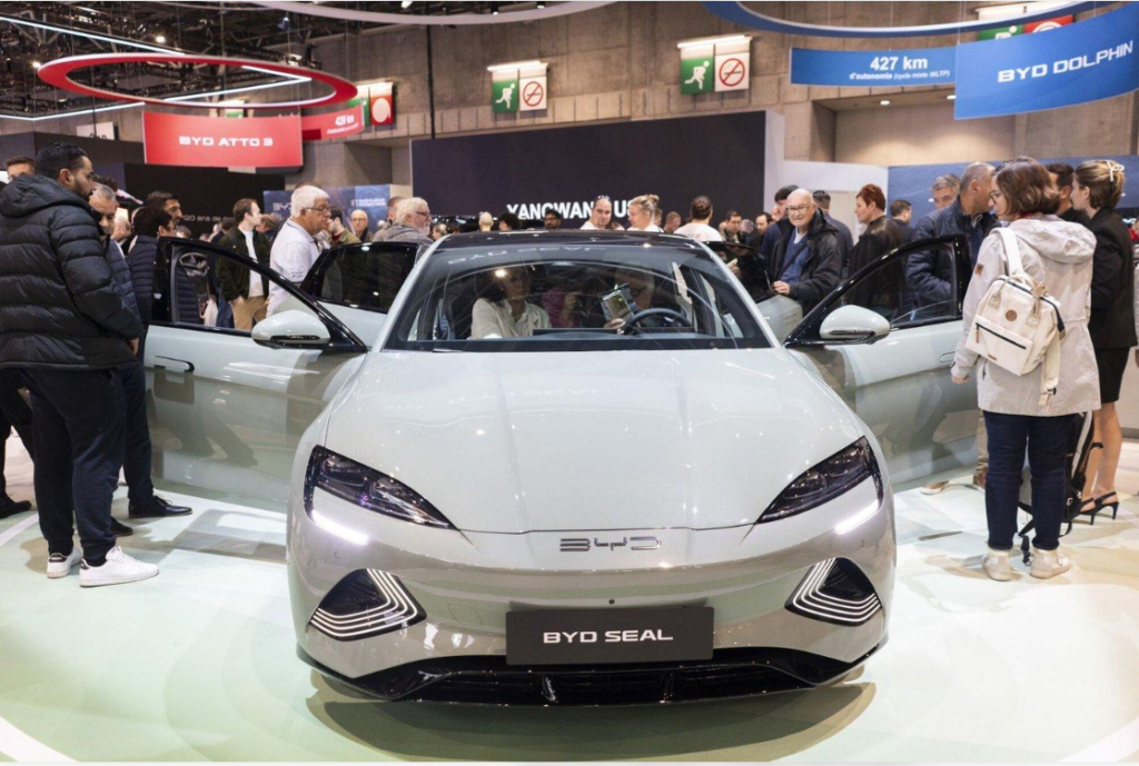 Chinese-manufactured electric vehicles displayed at a European automotive exhibition