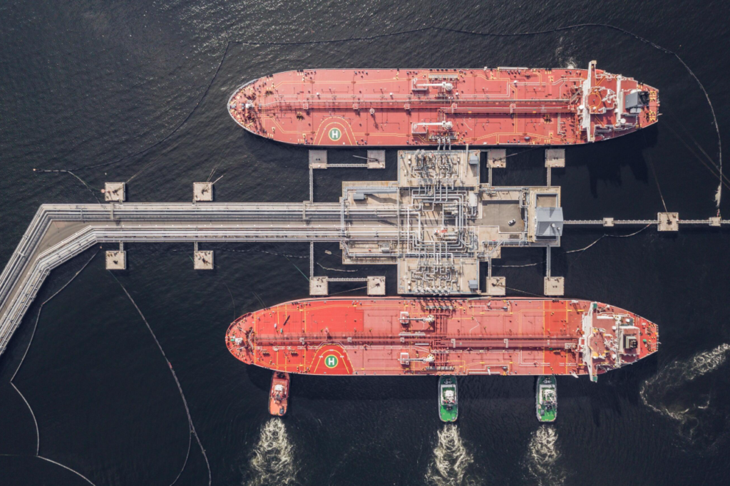 Crude oil tanker operating at a petroleum export terminal.