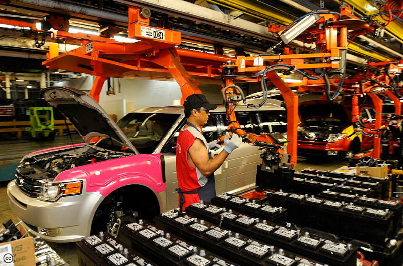 Vehicle manufacturing operations inside an Ontario automotive assembly facility.
