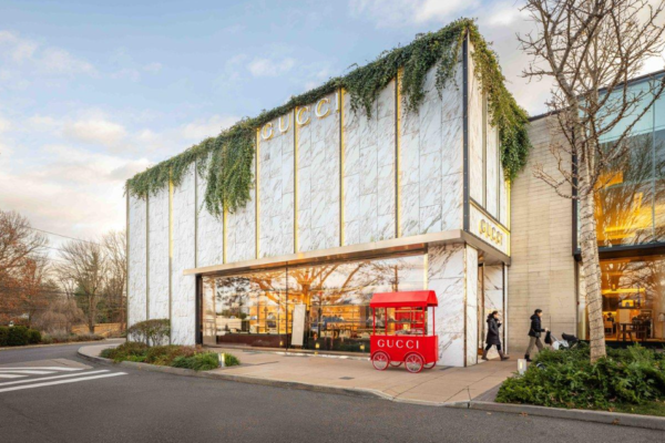 Exterior of a Gucci luxury fashion store at Americana Manhasset, New York.