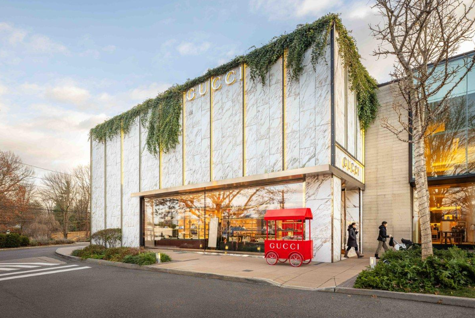 Exterior of a Gucci luxury fashion store at Americana Manhasset, New York.