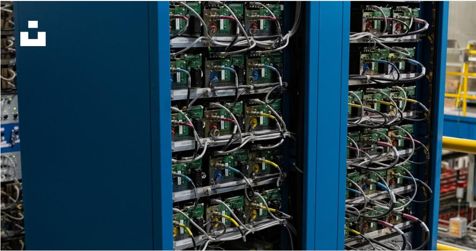 Electronic equipment and wiring installed in server racks at a Canadian research facility.