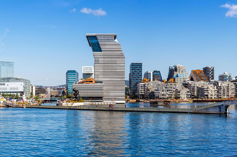 Oslo waterfront skyline with the Munch Museum and surrounding buildings.