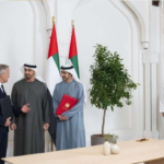 Canadian Prime Minister Mark Carney and Abu Dhabi Crown Prince Sheikh Khaled attend an agreement signing ceremony in Ottawa on October 27, 2026.