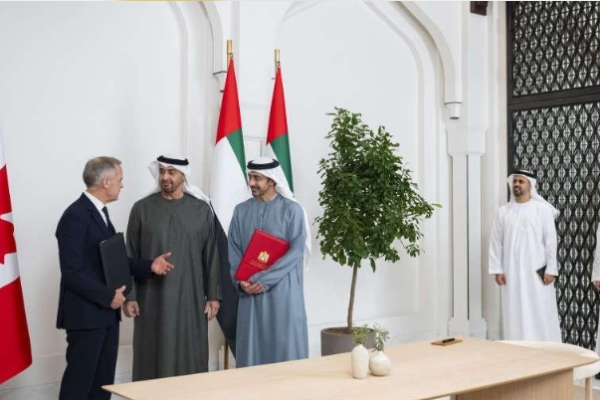 Canadian Prime Minister Mark Carney and Abu Dhabi Crown Prince Sheikh Khaled attend an agreement signing ceremony in Ottawa on October 27, 2026.