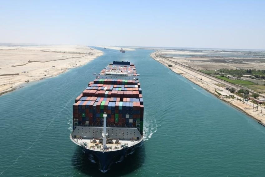 A commercial vessel navigates the Suez Canal, one of the world's most strategically important maritime trade routes.